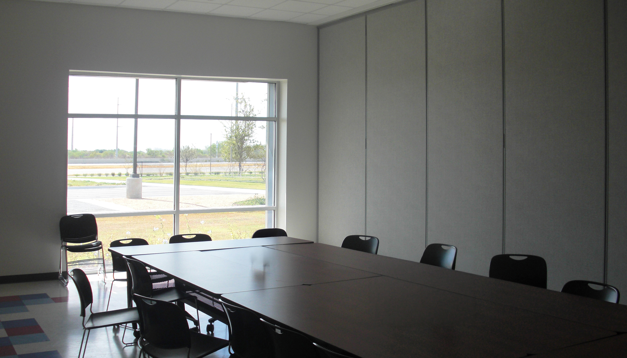 Interior meeting and collaboration room at the Laurie P. Andrews Paws Center featuring integrated administrative space and coordinated facility design developed to support shelter operations, staff coordination and community engagement.