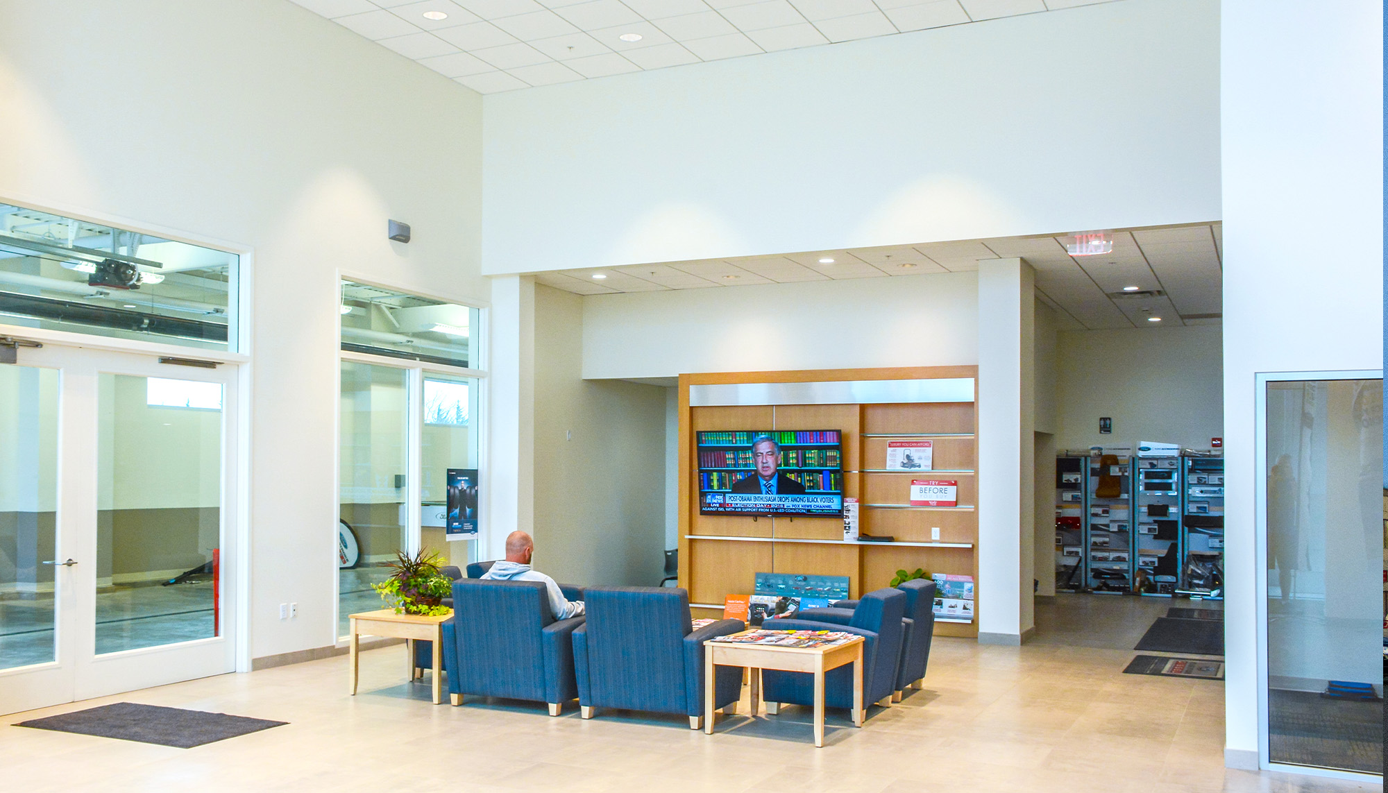 Commercial office lobby with open reception area, modern interior finishes and steel building construction.