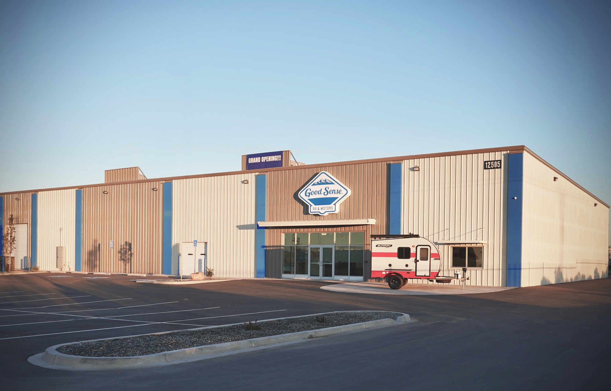 Exterior view of the Good Sense RV & Motors facility featuring integrated showroom, service space and large-scale metal building design.