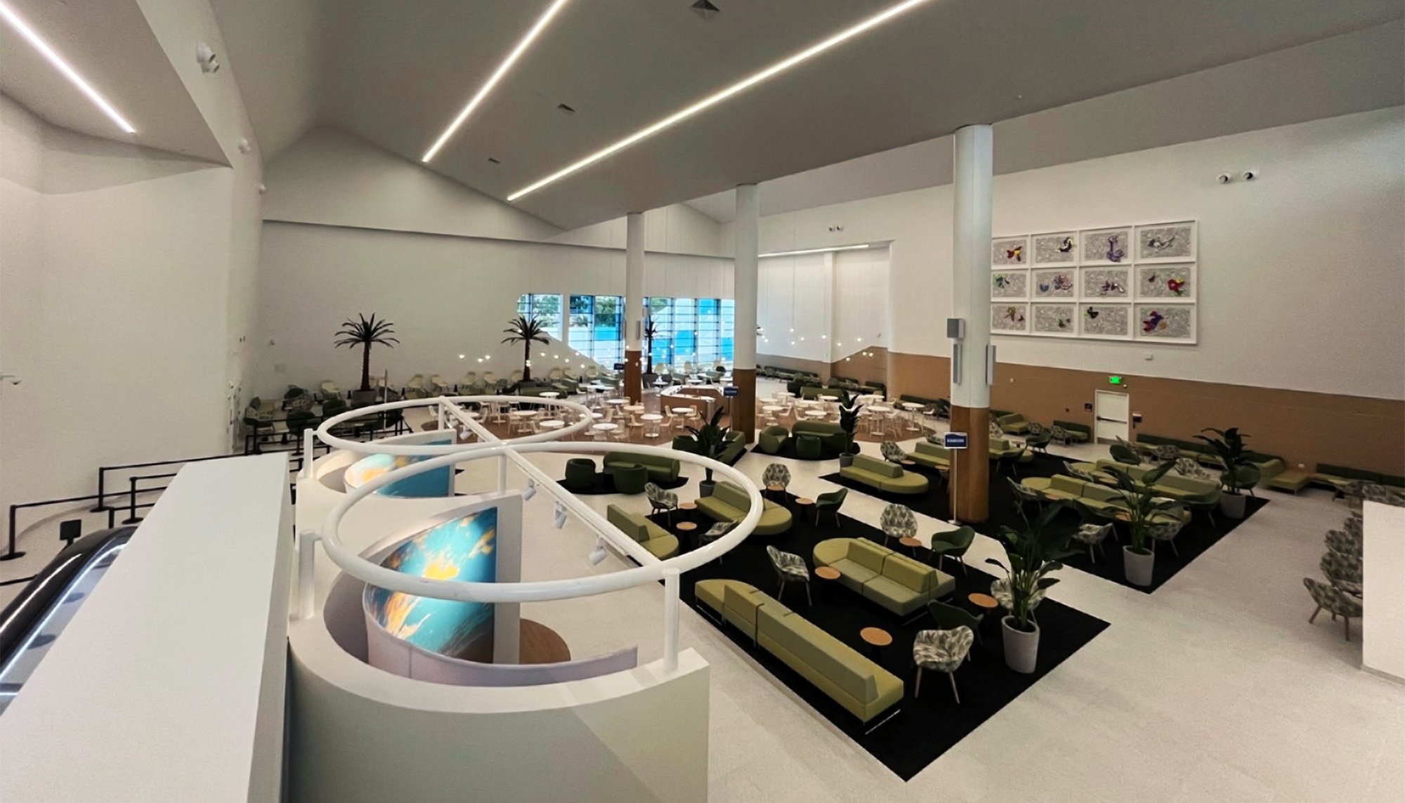 Interior lounge and passenger seating area at the PortMiami Terminal F Roof Retrofit featuring integrated gathering spaces, open circulation and a modernized terminal environment developed through coordinated retrofit execution.