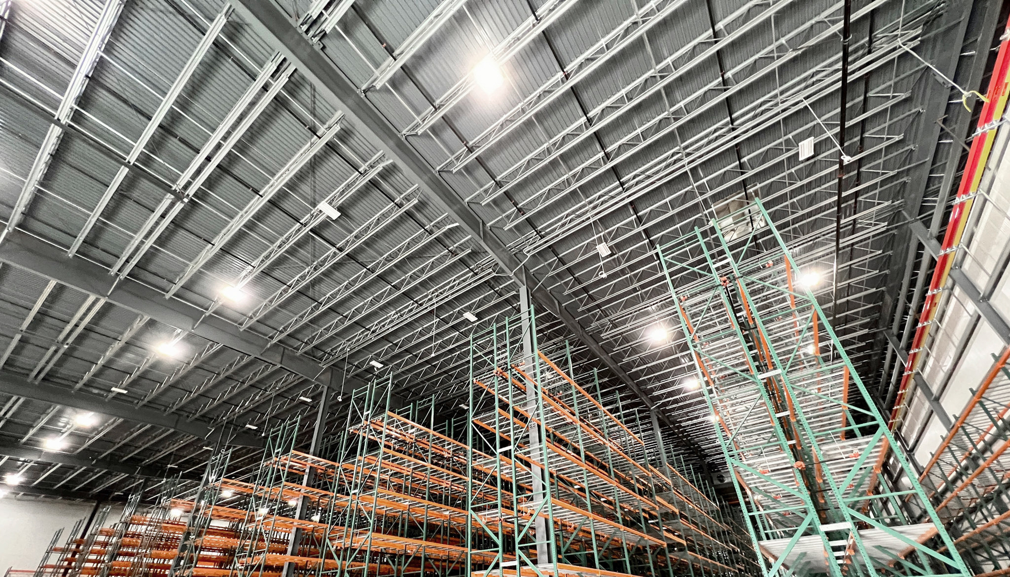 Interior storage area at the Northwest Harvest Distribution Center featuring high-capacity warehouse racking and integrated distribution infrastructure designed to support efficient food storage and rapid statewide fulfillment.