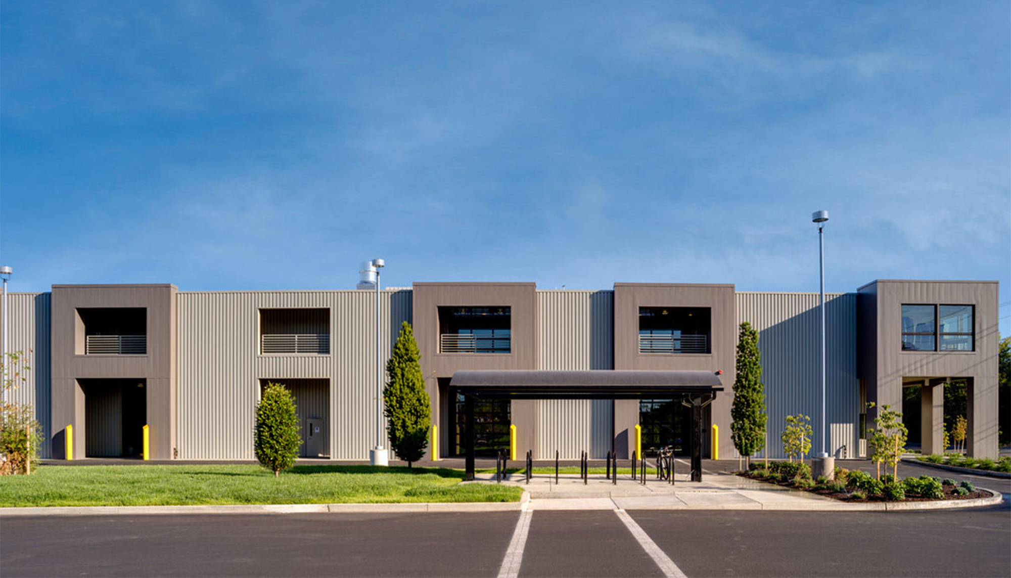 Front exterior view of the Oregon State University Campus Operations Center featuring a centralized multi-use facility designed to improve campus service coordination, operational efficiency and long-term institutional performance.