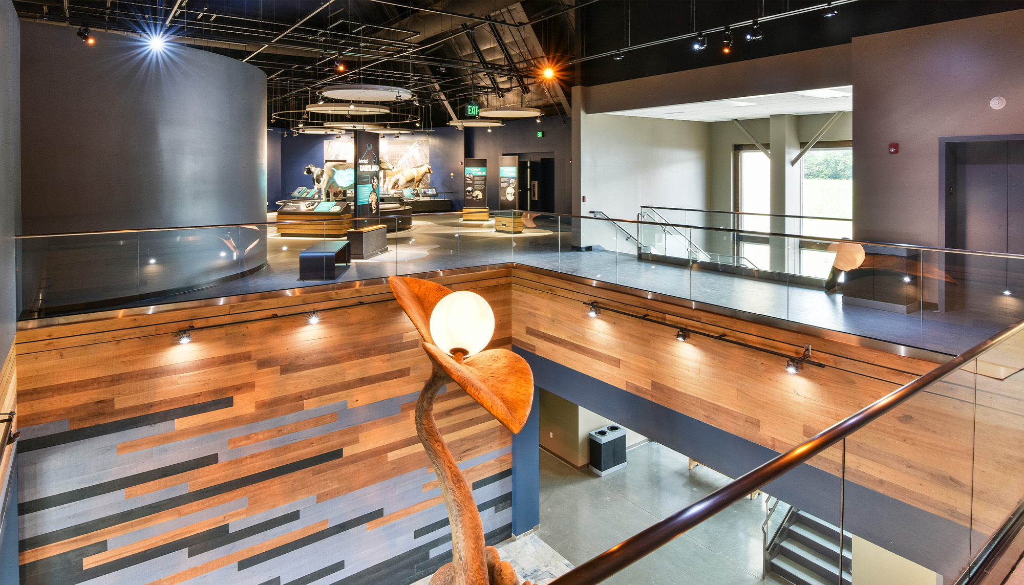 Agricultural museum and education center featuring interactive exhibits, multi-level gathering spaces and community facility design.