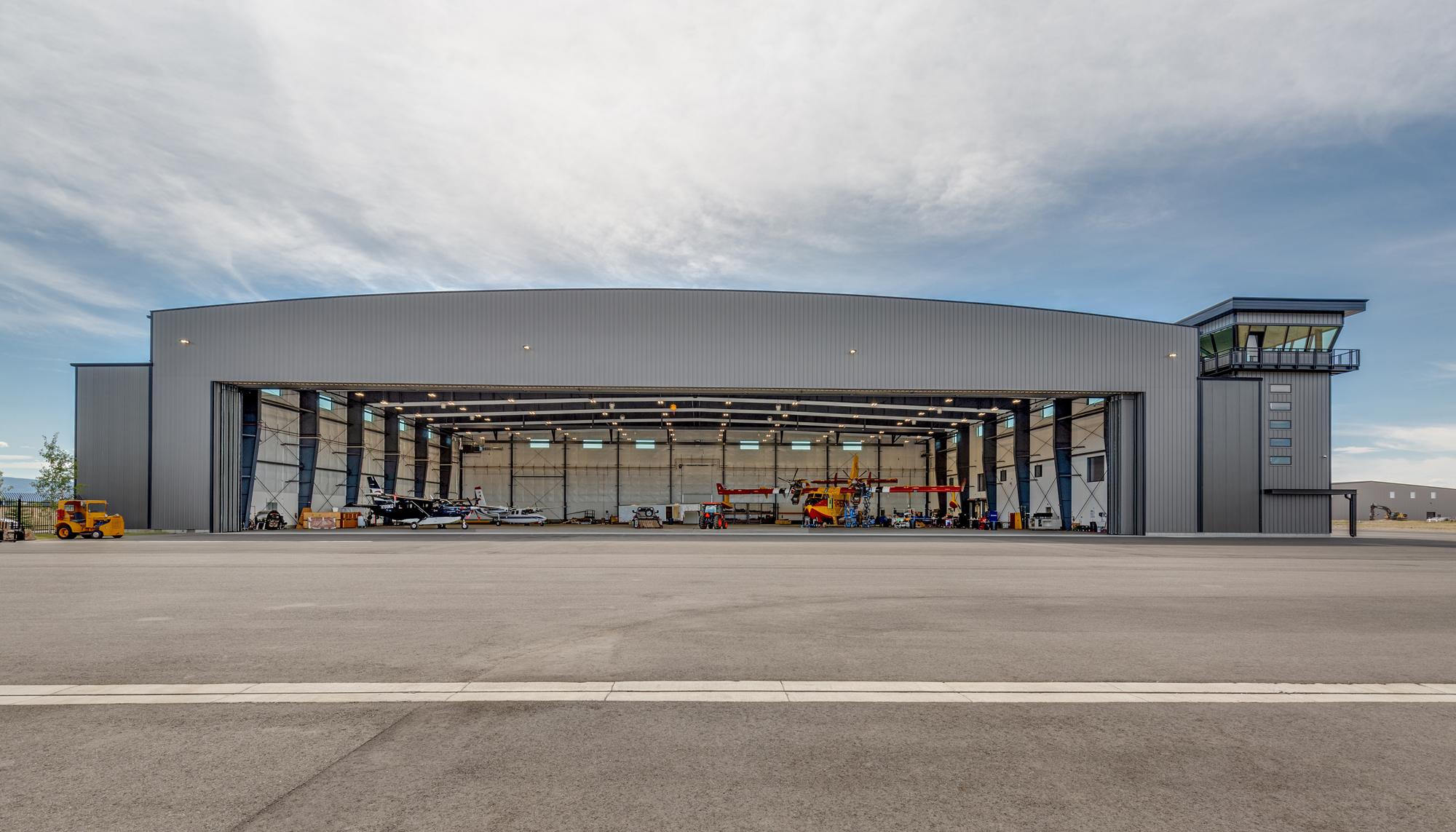 Bridger Aerospace Hangar featuring clear span steel framing, aircraft maintenance facility and large-span hangar door system.