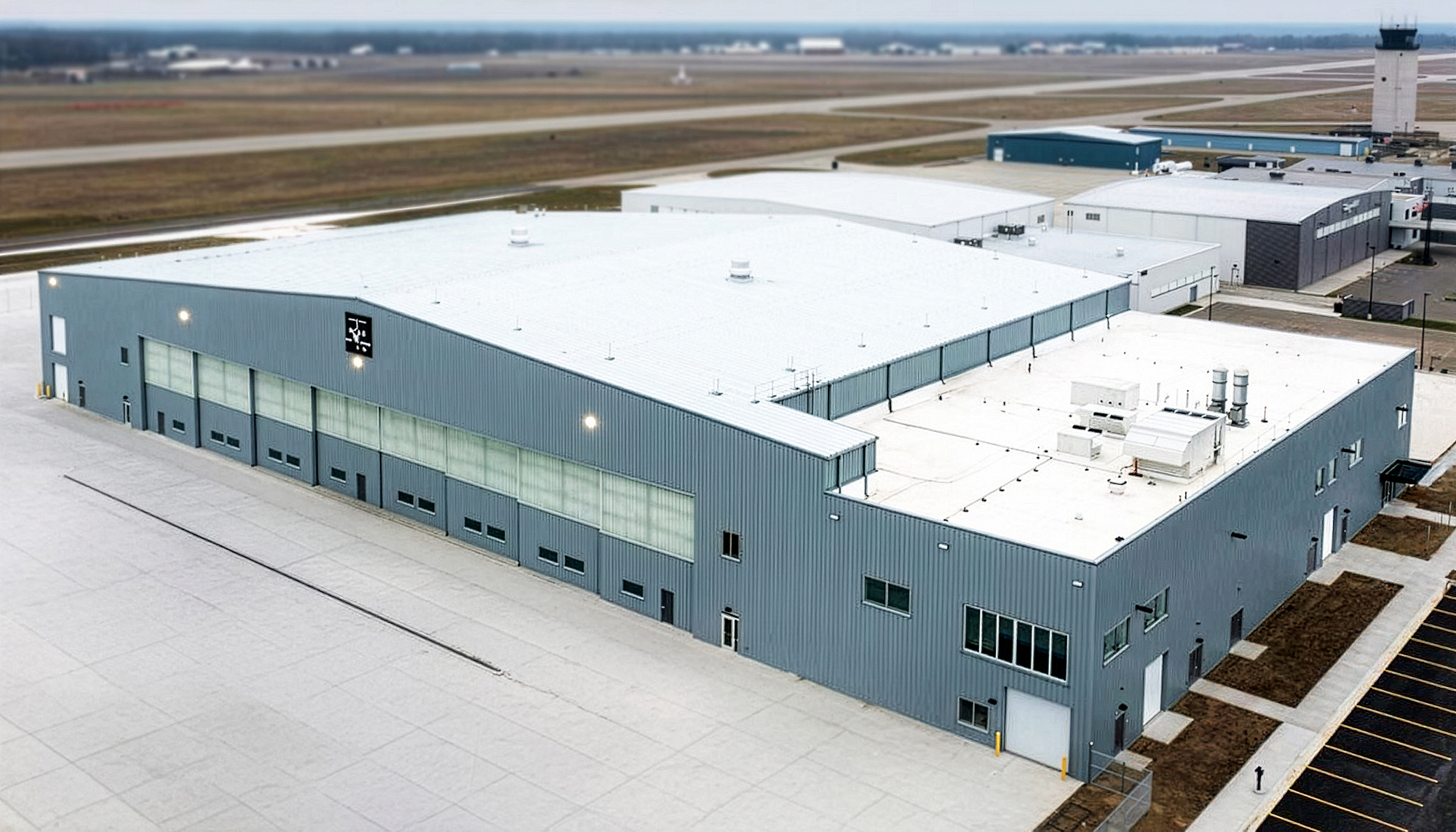 Aerial view of the Duncan Aviation aircraft maintenance facility featuring integrated hangar and support operations space.