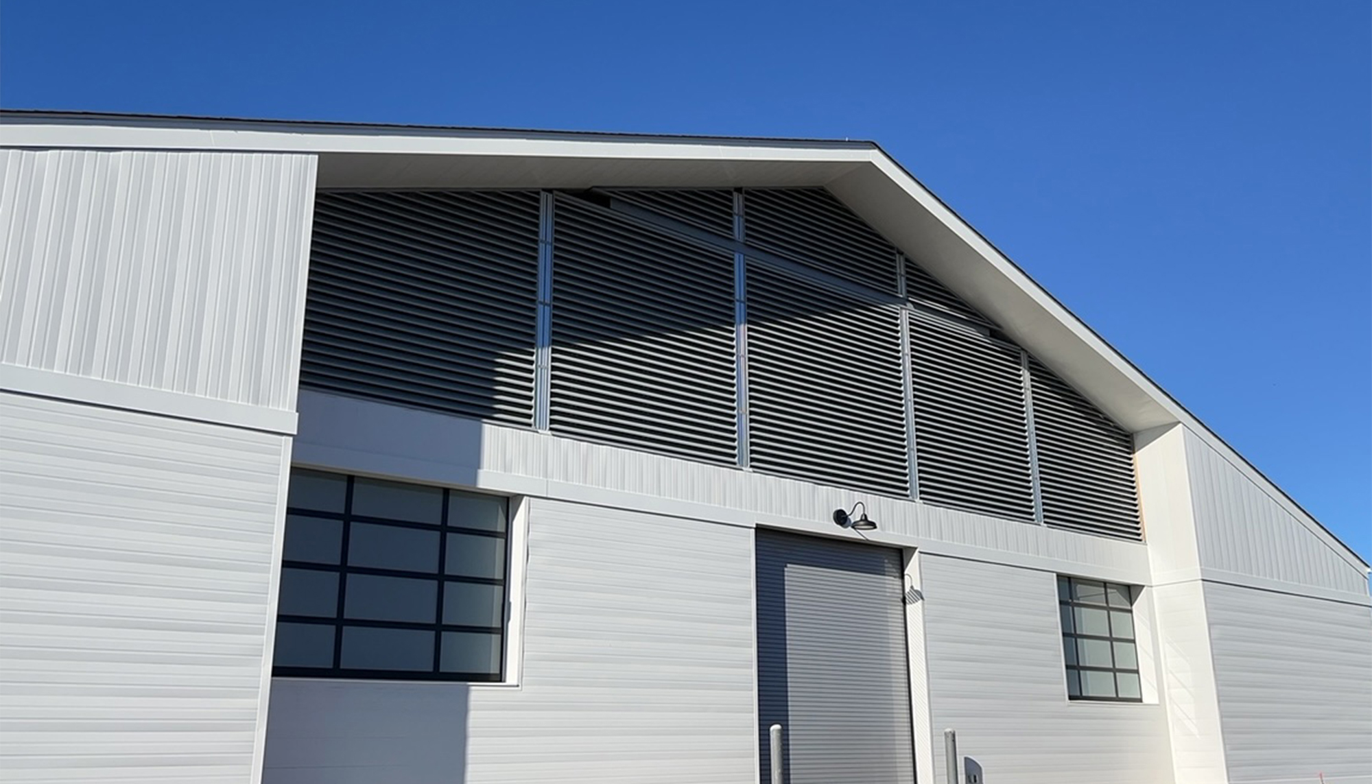 Exterior architectural detail of the Marion duPont Scott Equine Medical Center featuring integrated ventilation systems, durable building components and a controlled equine care environment designed to support year-round veterinary operations and rehabilitation activities.
