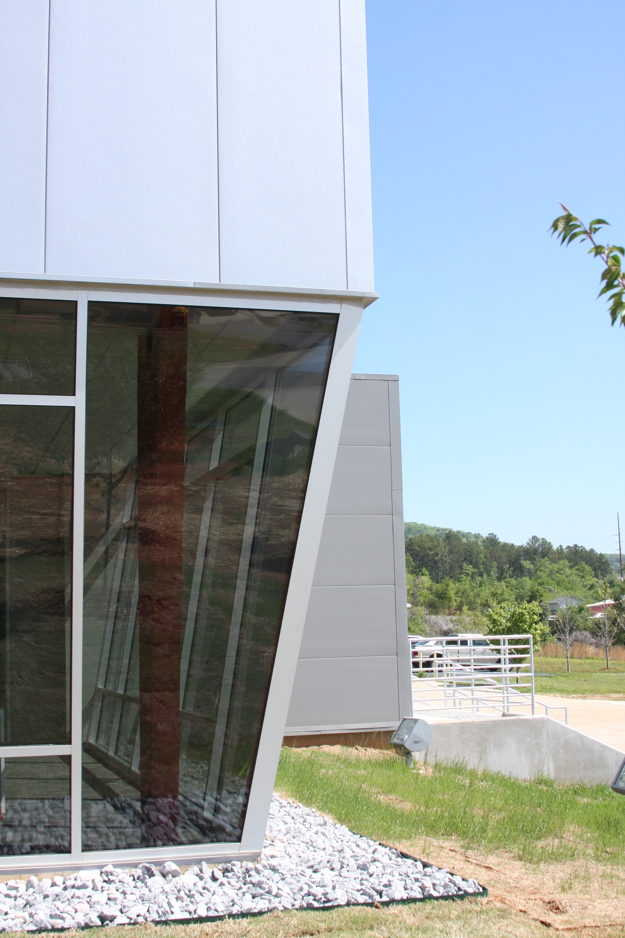 Commercial office facility with architectural metal panels, storefront glazing and pre-engineered steel building design.