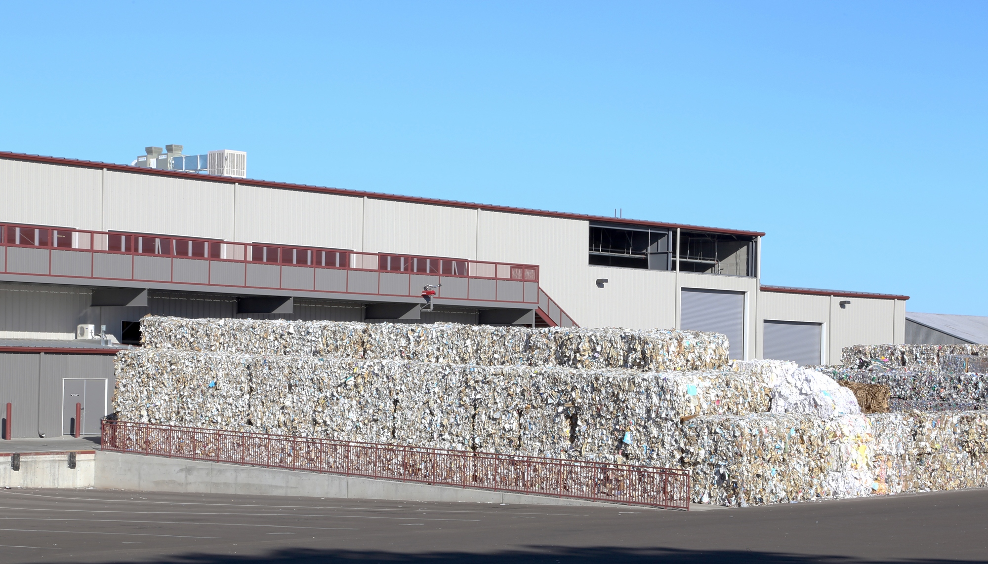 Exterior view of the Friedman Recycle Center featuring large-scale material storage, integrated processing infrastructure and a durable industrial environment designed to support safe, efficient recycling operations.