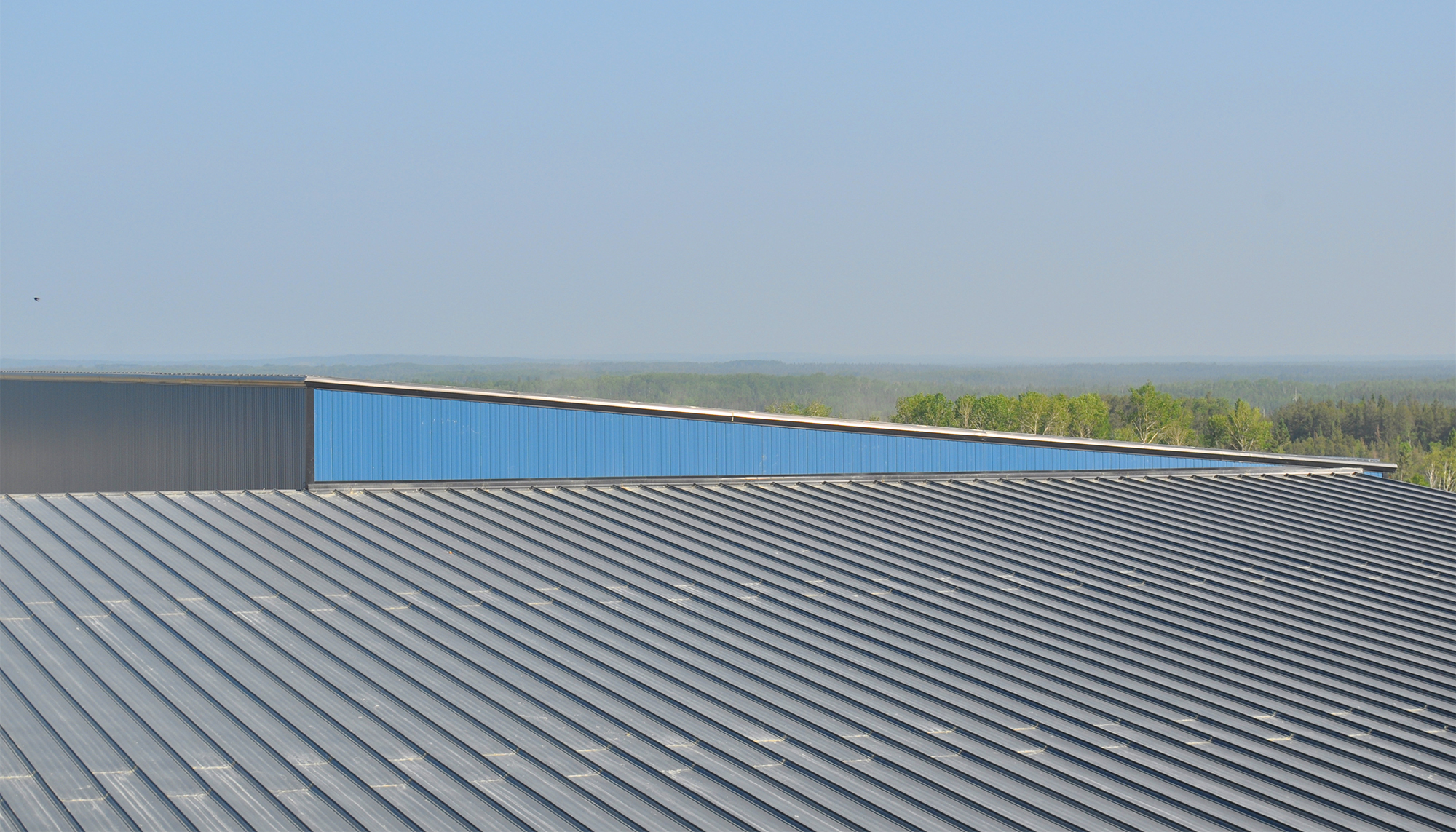 Standing seam metal roof system at the GreenStone Gold Mines processing facility.