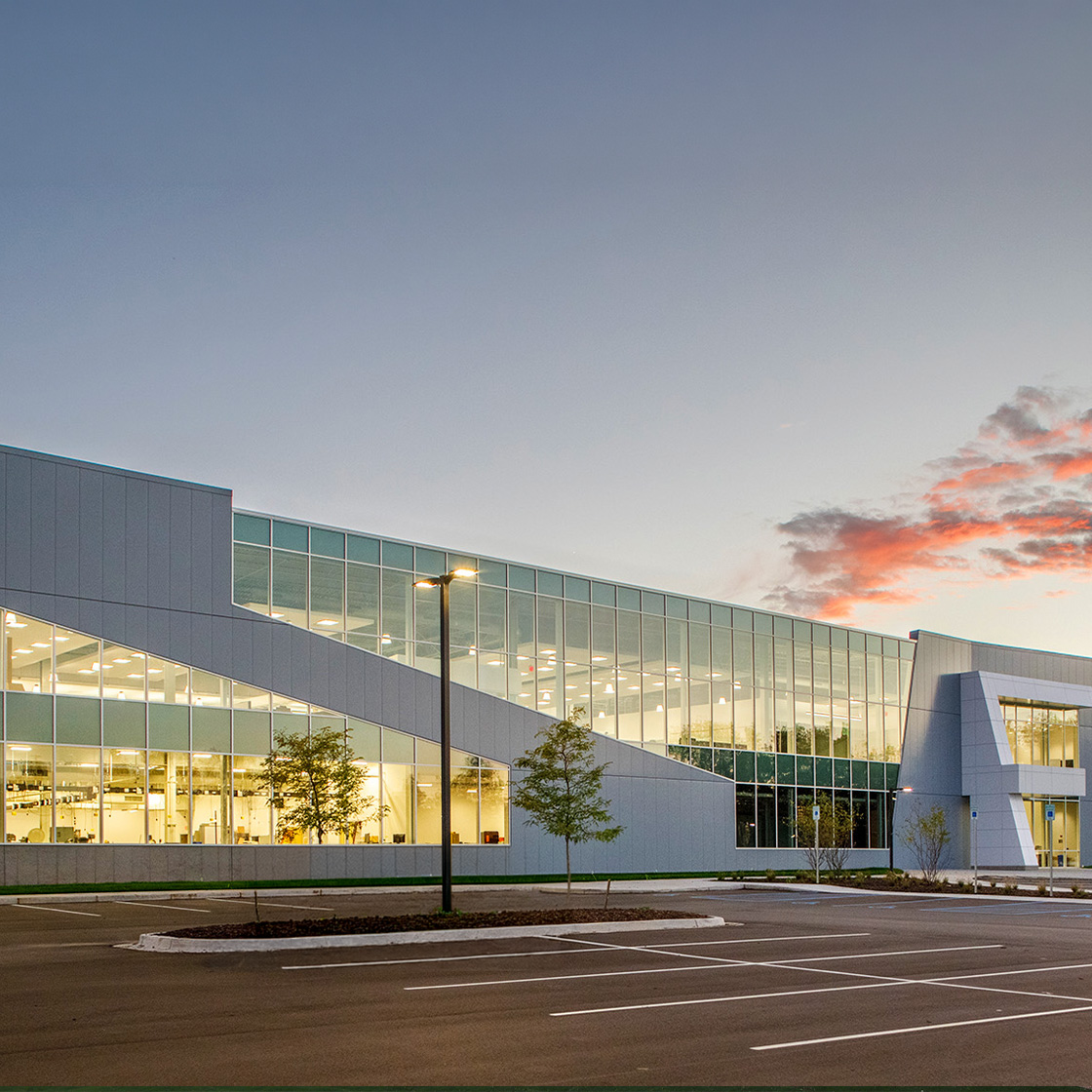 Hybrid steel building using conventional steel & pre-engineered metal building components. 