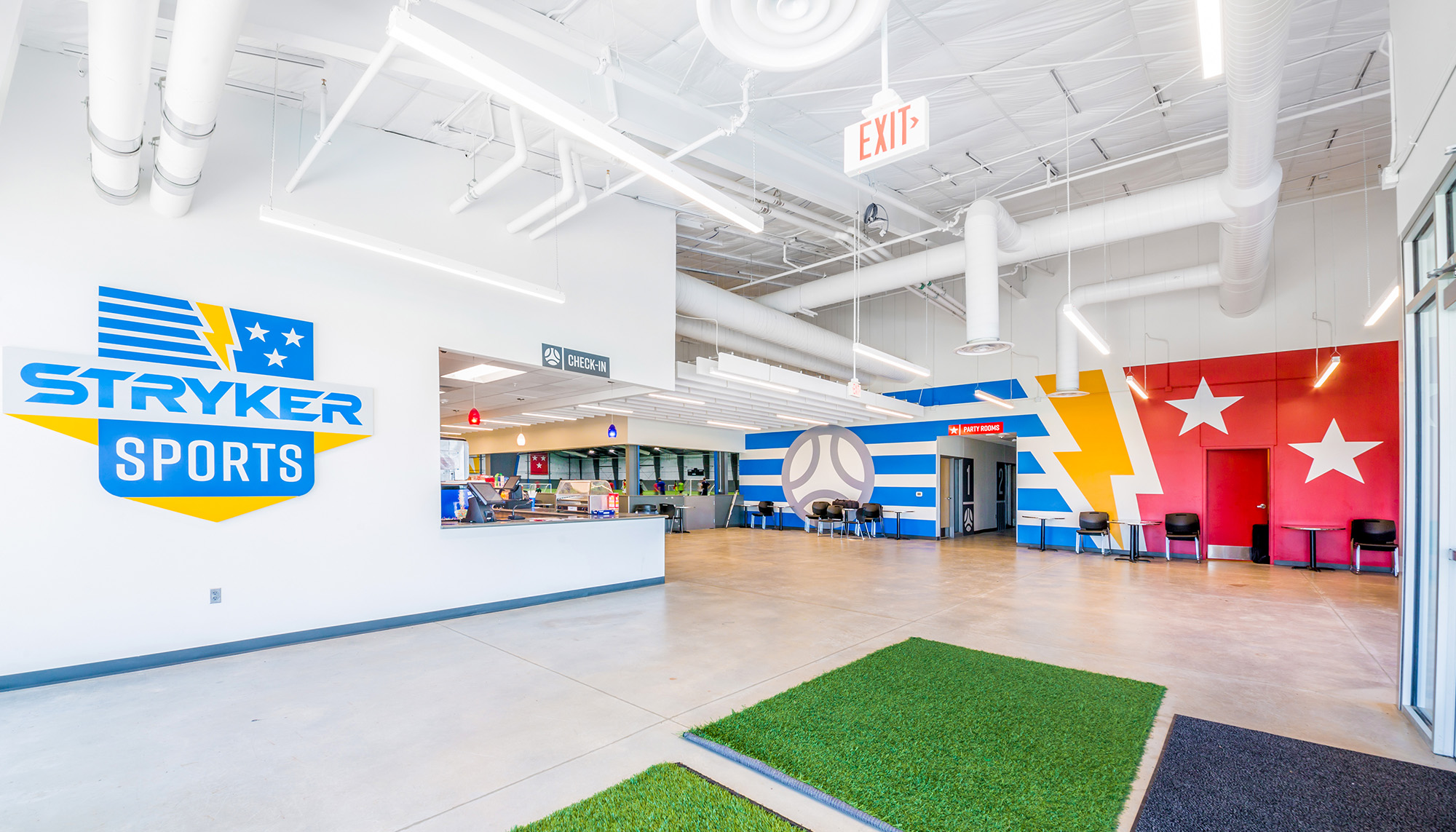Stryker Sports Complex lobby featuring open reception area, recreation facility amenities and modern sports complex design.