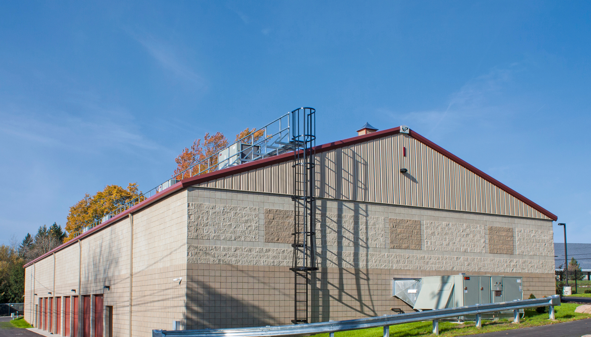 Exterior rear view of the Vanston/O'Brien, Inc. self-storage facility featuring durable steel construction, integrated operational infrastructure and coordinated multi-building design developed to support efficient maintenance and long-term property performance.