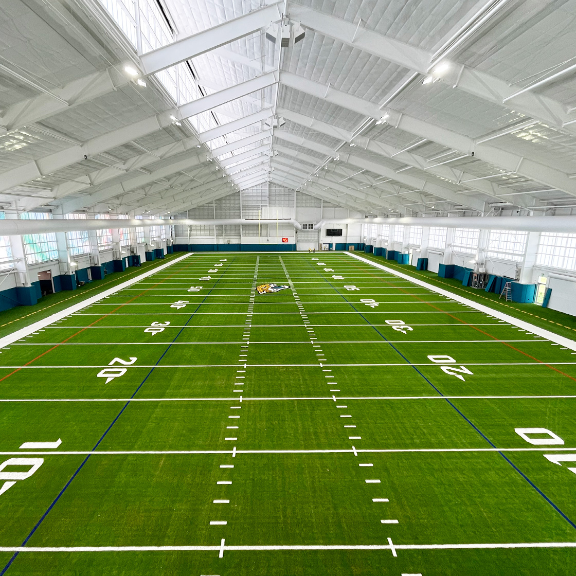 Sports arena pre-engineered metal building interior. 